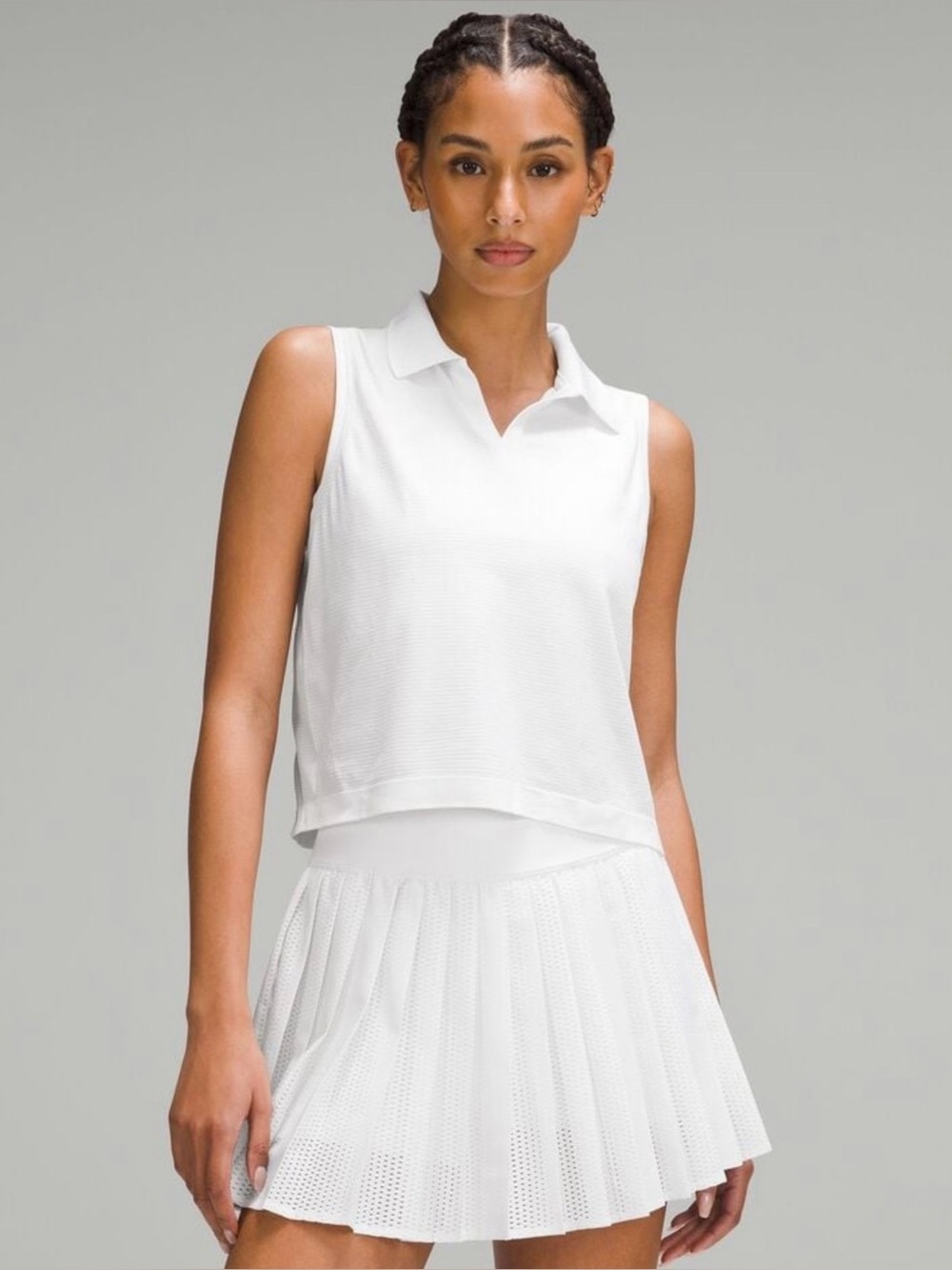 Swiftly Tech Sleeveless Polo in “Cream”